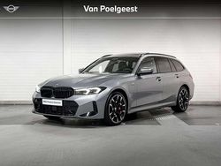 Skyscraper (licht grijs) Gebruikt 2024 BMW 330e M Sport Stationwagen | € 52.900 (Eerlijke prijs)
