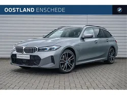 Grijs Gebruikt 2023 BMW 330e Executive Stationwagen | € 46.450 (Eerlijke prijs)