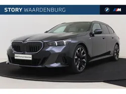 Grijs Gebruikt 2024 BMW 520 M Sport Stationwagen | € 82.950