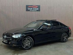 Zwart Gebruikt 2022 Mercedes C300e AMG line Sedan | € 42.900 (Goede deal)