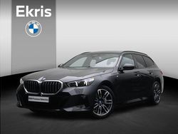 Grijs Gebruikt 2024 BMW 530e M Sport Stationwagen | € 58.900