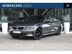 Grijs Gebruikt 2021 BMW 320e Executive Stationwagen | € 29.950 (Eerlijke prijs)