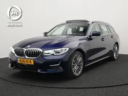 Blauw Gebruikt 2021 BMW 330e Luxury Line Stationwagen | € 33.440 (Goede deal)