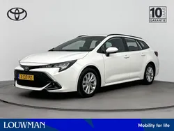 Wit Gebruikt 2024 Toyota Corolla Hybrid Active Stationwagen | € 29.950