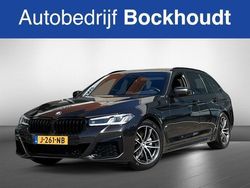 Grijs, metallic lak Gebruikt 2020 BMW 520 Executive Stationwagen | € 35.900 (Iets duurder)