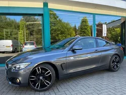 Grijs, metallic lak Gebruikt 2014 BMW 420 Sport Line Coupé | € 18.500 (Eerlijke prijs)