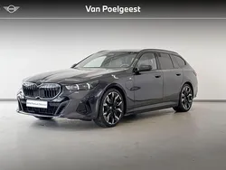 Grijs Gebruikt 2024 BMW 530e M Sport Stationwagen | € 74.895
