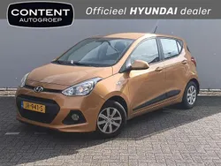 Oranje metallic Gebruikt 2016 Hyundai i10 Comfort Hatchback | € 8.440 (Eerlijke prijs)