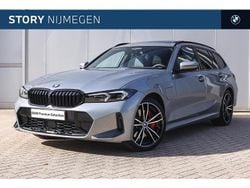 Skyscraper grey (grijs metallic) Gebruikt 2024 BMW 330e Comfort Edition Stationwagen | € 52.450 (Eerlijke prijs)