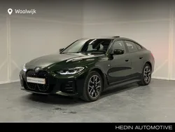 Groen Gebruikt 2022 BMW i4 Shadowline Sedan | € 43.880 (Eerlijke prijs)