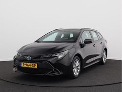 Zwart Gebruikt 2023 Toyota Corolla Hybrid Active Stationwagen | € 23.950 (Goede deal)