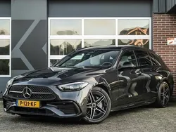 Grijs, metallic lak Gebruikt 2022 Mercedes C180 AMG line Stationwagen | € 41.950 (Eerlijke prijs)