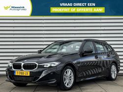 Zwart Gebruikt 2023 BMW 320e Basis Stationwagen | € 35.840 (Eerlijke prijs)