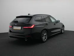 Zwart Gebruikt 2021 BMW 318 Sport Line Stationwagen | € 30.900 (Goede deal)