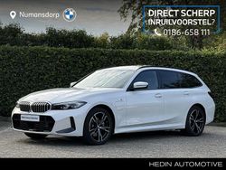 Wit Gebruikt 2025 BMW 330e M Sport Stationwagen | € 54.895 (Eerlijke prijs)