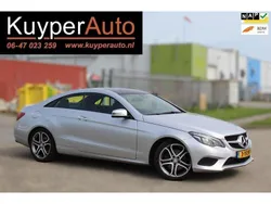 Grijs, metallic lak Gebruikt 2014 Mercedes E200 Prestige Coupé | € 16.975 (Eerlijke prijs)