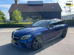 Blauw, metallic lak Gebruikt 2021 Mercedes C300e AMG Stationwagen | € 27.900 (Super prijs)