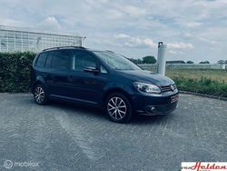 Blauw, metallic lak Gebruikt 2014 VW Touran MPV | € 12.950 (Duur)