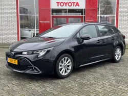 Zwart Gebruikt 2024 Toyota Corolla Hybrid Active Stationwagen | € 28.900
