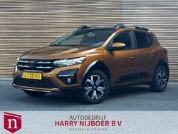 Oranje, metallic lak Gebruikt 2021 Dacia Sandero Comfort Hatchback | € 14.850 (Eerlijke prijs)