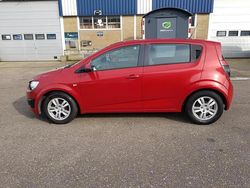 Rood (metallic) Gebruikt 2012 Chevrolet Aveo LT Hatchback | € 1.999 (Super prijs)
