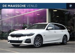 Wit Gebruikt 2021 BMW 320e Comfort Edition Stationwagen | € 30.950 (Eerlijke prijs)
