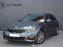 Grijs, metallic lak Gebruikt 2022 BMW 330e M Sport Stationwagen | € 37.900 (Goede deal)