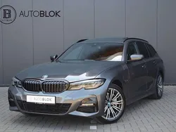 Grijs, metallic lak Gebruikt 2022 BMW 330e M Sport Stationwagen | € 37.900 (Goede deal)