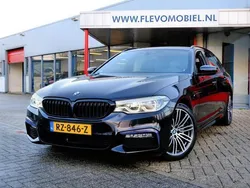 Zwart, metallic lak Gebruikt 2018 BMW 520 M Sport Stationwagen | € 27.950 (Goede deal)