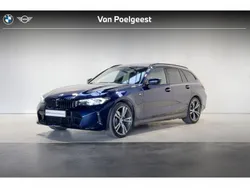 Tansanitblau metallic (donker blauw metallic) Gebruikt 2024 BMW 320e Comfort Edition Stationwagen | € 48.995 (Duur)