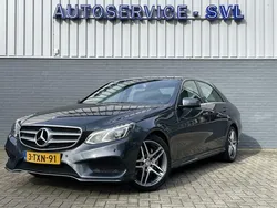 Grijs, metallic lak Gebruikt 2014 Mercedes E300 Style Sedan | € 24.950 (Iets duurder)