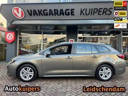 Bruin Gebruikt 2022 Toyota Corolla Hybrid Business Edition Stationwagen | € 22.950 (Eerlijke prijs)