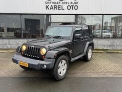 Zwart, metallic lak Gebruikt 2012 Jeep Wrangler Sahara SUV | € 31.950