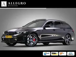 Zwart Gebruikt 2024 BMW 320e M Sport Stationwagen | € 44.945 (Eerlijke prijs)