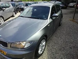 Grijs Gebruikt 2009 BMW 116 Sport Line Hatchback | € 3.995 (Eerlijke prijs)