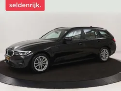 Zwart Gebruikt 2021 BMW 320e Basis Stationwagen | € 22.400 (Goede deal)