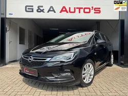 Zwart, metallic lak Gebruikt 2017 Opel Astra Stationwagen | € 11.995 (Eerlijke prijs)
