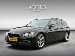 Zwart (metallic) Gebruikt 2017 BMW 330 Executive Stationwagen | € 16.995 (Goede deal)