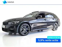 Zwart Gebruikt 2021 BMW 330e Basis Stationwagen | € 30.995 (Eerlijke prijs)