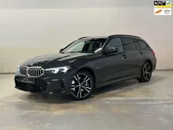 Grijs Gebruikt 2023 BMW 320e M Sport Stationwagen | € 39.900 (Iets duurder)