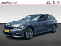 Grijs Gebruikt 2021 BMW 330e Executive Stationwagen | € 31.430 (Eerlijke prijs)