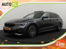 Grijs Gebruikt 2021 BMW 320 Executive Stationwagen | € 31.940 (Iets duurder)