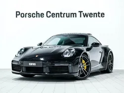 Diepzwart metallic Gebruikt 2020 Porsche 911 Turbo S Coupé | € 219.900