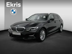 Zwart Gebruikt 2022 BMW 320e Executive Stationwagen | € 33.900 (Goede deal)