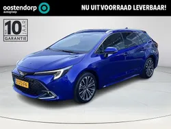 Blauw Gebruikt 2024 Toyota Corolla Hybrid Stationwagen | € 32.900