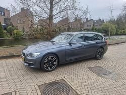 Grijs (metallic) Gebruikt 2015 BMW 328 Executive Stationwagen | € 15.500 (Goede deal)
