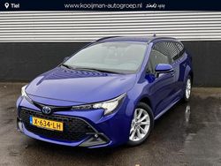 Blauw Gebruikt 2023 Toyota Corolla Hybrid Active Stationwagen | € 24.850