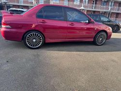 Rood Gebruikt 2004 Mitsubishi Lancer Comfort Edition Sedan | € 1.500 (Goede deal)