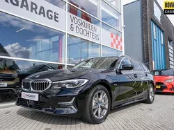 Zwart Gebruikt 2022 BMW 330 Luxury Line Stationwagen | € 35.950 (Goede deal)