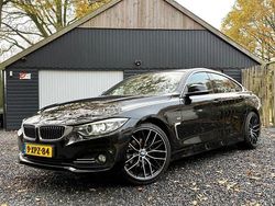 Zwart (metallic) Gebruikt 2014 BMW 420 Luxury Line Coupé | € 15.850 (Eerlijke prijs)